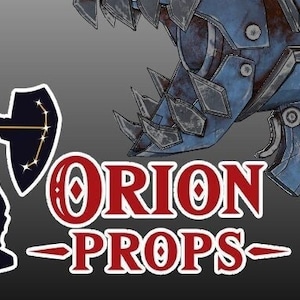 May include: A blue and silver mechanical shark-shaped weapon with a long barrel and a detailed, toothy mouth. The weapon has a rusty appearance and is made of metal.