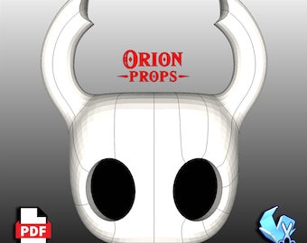 May include: A white, stylized mask with large, black eye holes and two curved horns. The mask has a segmented design and the text "ORION PROPS" in red. A PDF icon and a paper cutout icon are in the lower corners.