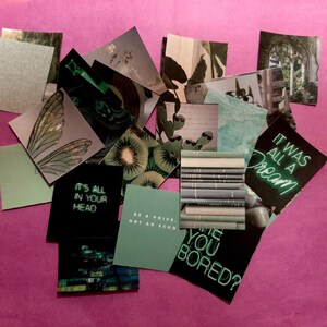 Może przedstawiać: Zbi&oacute;r zielonych i czarnych kart z wzorami i inspirującymi cytatami, w tym "To wszystko jest w twojej głowie" i "Bądź głosem, a nie echem".