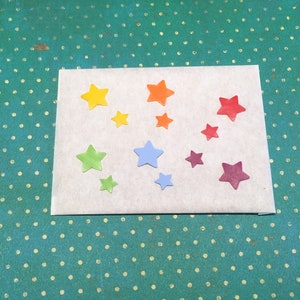 Wax stars colored in 2 sizes 12 pcs. 1 cm