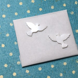 Wax doves mini mother of pearl looking right and looking left 1.5 cm