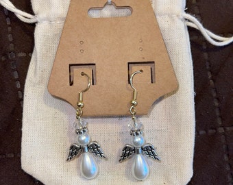 white angel hang earrings