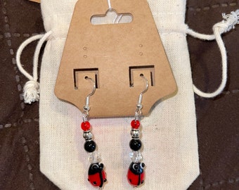 red ladybug hang earrings