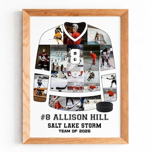 May include: Framed print featuring a hockey jersey design with player photos. The jersey shape contains multiple action shots of hockey players in red and white uniforms. The jersey displays the number 8, the name "ALLISON HILL", and "SALT LAKE STORM TEAM OF 2026". A black hockey puck is at the bottom.