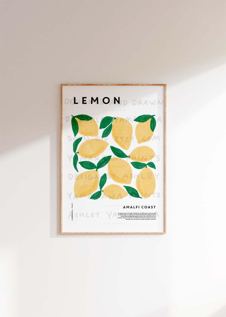 May include: A printable art print featuring a stylized illustration of lemons with green leaves. The print has the text "LEMON AMALFI COAST" and a description of the Amalfi Coast lemons.
