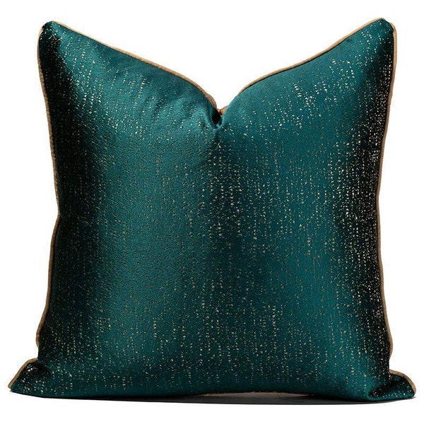 Luxurious rich green and gold pillow cover that creates glamourous luster that pops on any bed, sofa or armchair.