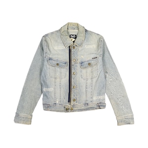 May include: Light blue denim jacket with a distressed look. Features a dark blue zipper, two chest pockets, and button closures. The collar displays the "D&G" logo. A classic, casual outerwear piece.