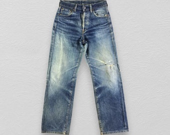 Vintage des années 90 Levis 702 Redline Jeans Lavage moyen Levi's selvedge bleu délavé denim en détresse taille 28 x 29
