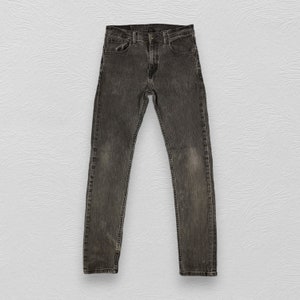 May include: A pair of dark gray denim jeans with a straight leg fit.