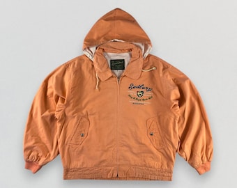 Chaqueta bomber con capucha vintage Sudbury de BLOOD STOCK CO., de algodón color naranja melocotón, estilo universitario, talla L.