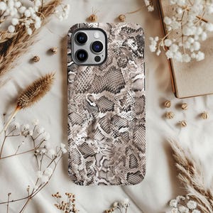 a phone case with a snake skin pattern on it