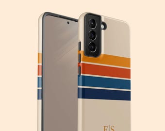 May include: A beige smartphone case featuring horizontal stripes in orange, red, and two shades of blue. The case includes a camera cutout and the gold-colored initials E S printed near the bottom. The design wraps around the side of the phone.