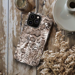 a phone case sitting on top of a wooden table