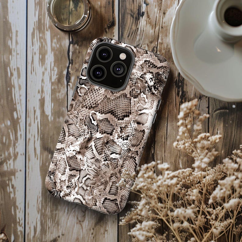 a phone case sitting on top of a wooden table