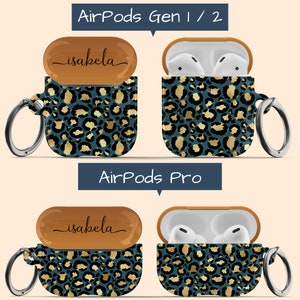 May include: Two AirPods cases with a leopard print design. The top case is for AirPods Gen 1/2 and the bottom case is for AirPods Pro. Both cases have a gold and blue color scheme and the top case has the name "isabela" written on it.