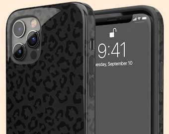 May include: A black smartphone case featuring a tonal leopard print pattern. The case has a glossy finish and cutouts for the rear camera lenses. The phone screen displays the time 9:41 and the date Wednesday, September 10 with a lock icon.