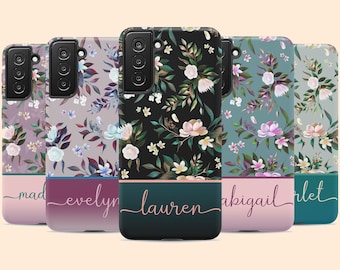 May include: Five smartphone cases featuring floral patterns with various background colors including black, teal, and lavender. Each case has a solid-colored horizontal band at the bottom with a name written in a cursive script font in white.
