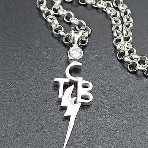 Μενταγιόν Elvis Presley. T.C.B. Pendant Elvis Presley.