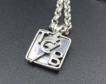 Μενταγιόν T.C.B. Elvis Presley. T.C.B. pendant Elvis Presley.