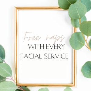 May include: A gold-framed sign with the text "Free naps with every facial service" against a white background with green eucalyptus leaves.