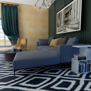 May include: A blue sectional sofa with a white and black patterned rug. A white bookshelf with four shelves holds books and is next to the sofa. The sofa is in a living room with green and yellow walls and a large framed picture on the wall.