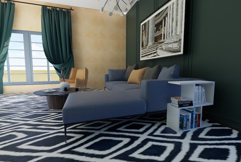 May include: A blue sectional sofa with a white and black patterned rug. A white bookshelf with four shelves holds books and is next to the sofa. The sofa is in a living room with green and yellow walls and a large framed picture on the wall.