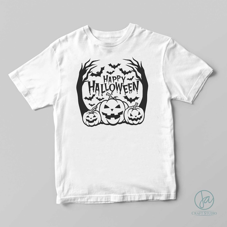 May include: White t-shirt with a black graphic design featuring three jack-o'-lanterns, bats, and the text "Happy Halloween".