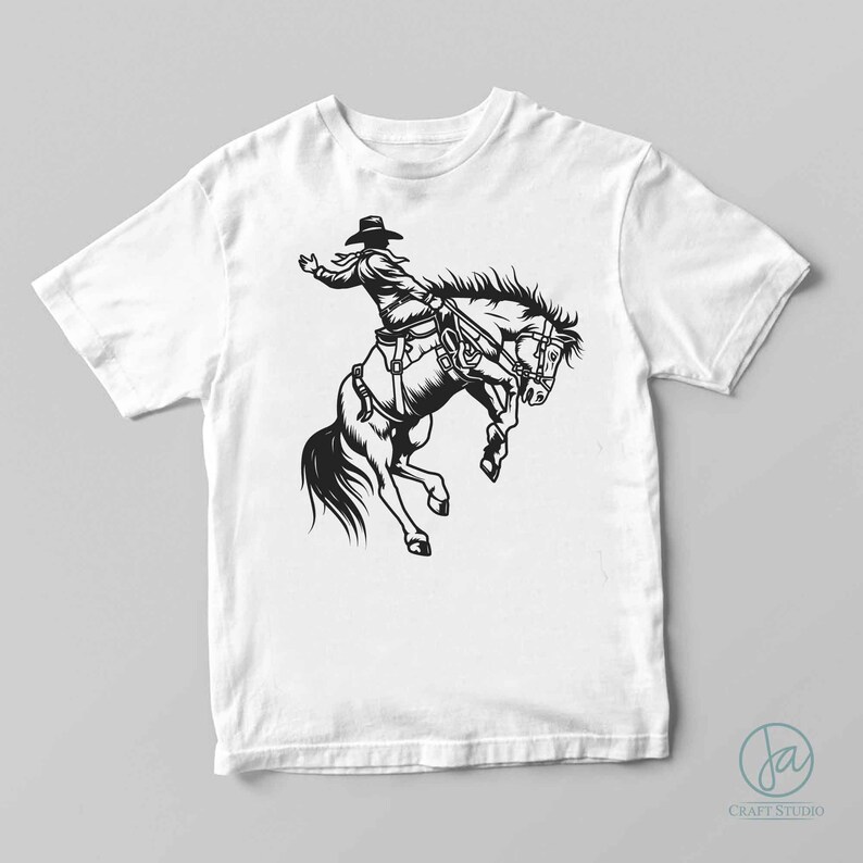 May include: Black and white illustration of a cowboy riding a bucking bronco. The cowboy is wearing a hat and has his arm raised. The horse is rearing up on its hind legs.