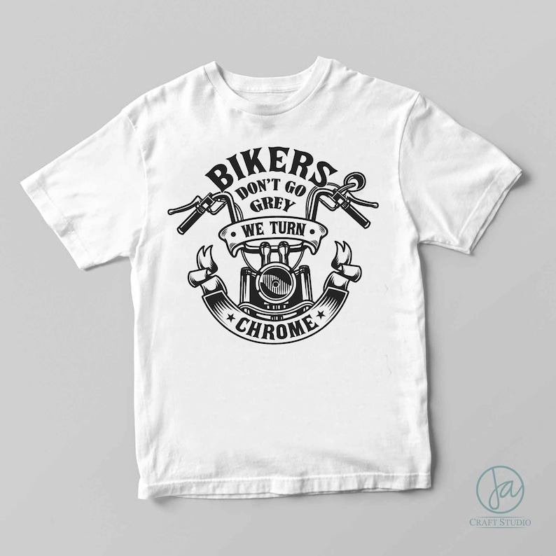 May include: White t-shirt with a black graphic design of a motorcycle with the text "Bikers Don't Go Grey We Turn Chrome".