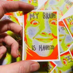 my brain is haunted matte Sticker