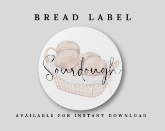 May include: A white circle label with the text "Sourdough" in black cursive script. The label features a watercolor illustration of a basket of sourdough bread.