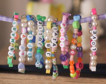 Personalized beaded bracelet in several colors with first name, dates, letters, messages, initials