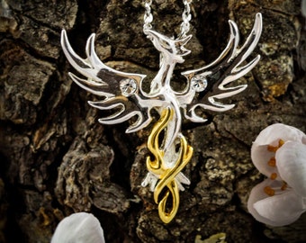 Sun Phoenix - lucky talisman by Anne Stokes. Sterling Silver with gold plating.