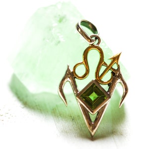 Liberia - fire talisman. Sterling Silver and gold with peridot. Fire zodiac signs.