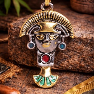 May include: A set of three ceramic mugs with a speckled, matte finish. The mugs are in shades of cream, light gray, and dark gray. Each mug has a simple, minimalist design and a rounded handle. The mugs are stacked on top of each other.