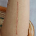 Realistic Cut Temporary Tattoo 10cm | Fresh & Healing SFX Wound | Halloween Cosplay Costume | Film Theatre Prop product logo