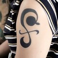 Mikan Pinwheel Nami Temporary Tattoo: One Piece Cosplay, Halloween Accessory product logo