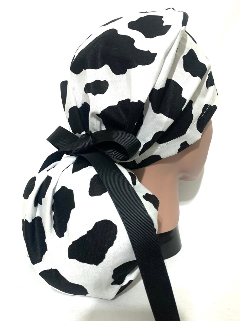 black & white cow print pony hair women's slides
