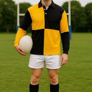 May include: A person wearing a yellow and black rugby shirt, white shorts, black socks, and black shoes, holding a white rugby ball. The shirt has a collared neckline and long sleeves. The background is a green field with rugby goalposts.