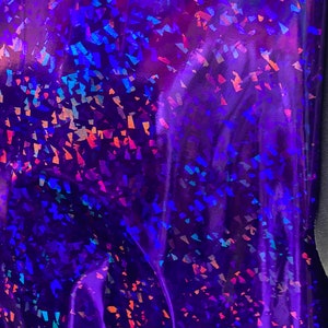 Latex shattered glass design super shiny hologram vinyl four-way stretch fabric sold by the yard. Available in a variety of colors.