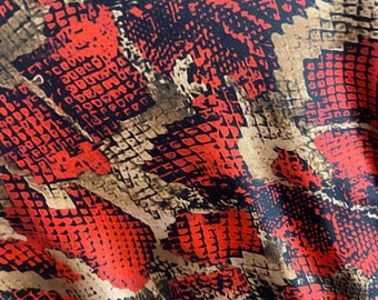 Snake print on nylon spandex four way stretch fabric sold by the yard available in 2 colors