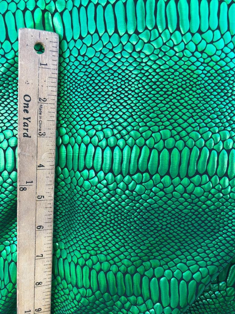 green snake print pants