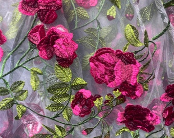 Rose embroidery design on non stretch mesh fabric sold by the yard