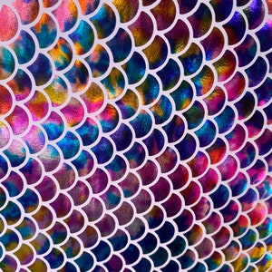 Tie dye/oil slick mermaid fish scale design on great quality nylon spandex four stretch fabric sold by the yard