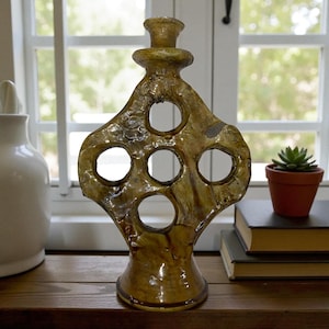 yellow terracotta candle holders