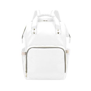 May include: White canvas diaper bag backpack with gold zipper accents and a large front pocket.
