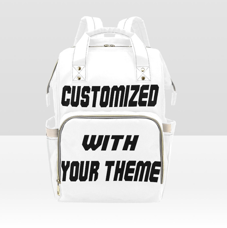 May include: White diaper bag backpack with black text that says "CUSTOMIZED WITH YOUR THEME".