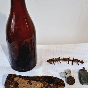 Rare!!! Combination lot of the 1st World War, shrapnel ,beer bottle,Austro-Hungarian axe,barbed wire,artilleryman&#39;s button,lighter