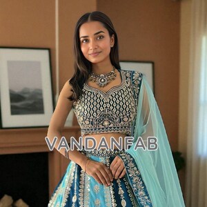 Embroidered Faux Georgette Lehenga Choli with Zari & Sequin Work