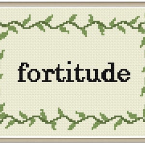 May include: Cross-stitch artwork featuring the word "fortitude" in black block letters. The word is centered on a light beige background, framed by a green vine border with leaves. The artwork is set in a light brown wooden frame.